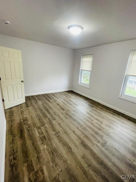 281 5th Street Whitehall, PA 18052 - Photo 21 of 36 an empty room with wooden floor and windows