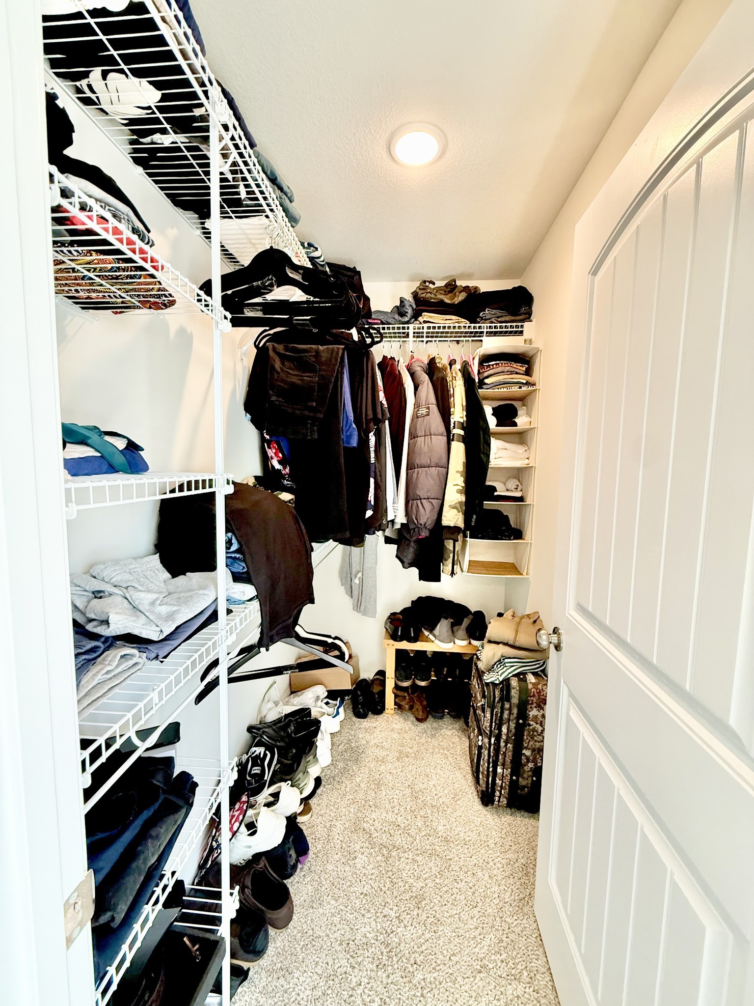 144 Quarry Rdg Road Clarksville, TN 37043 - Photo 6 of 10 a view of walk in closet with clothes and shoes