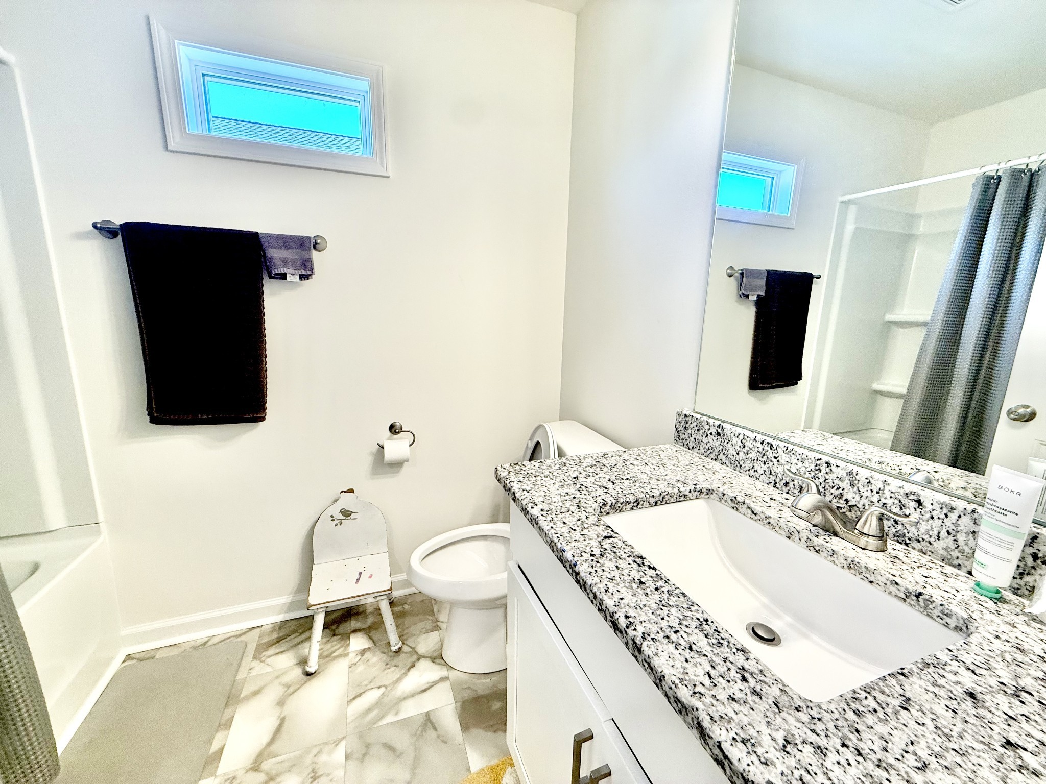 144 Quarry Rdg Road Clarksville, TN 37043 - Photo 8 of 10 a bathroom with a granite countertop sink and a mirror