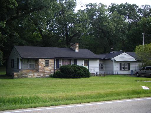 1515 Widows Road Wilmington, IL 60481 - Photo 1 of 1 a front view of a house with a garden