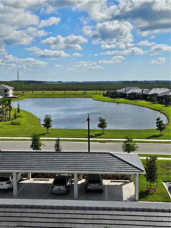 5749 Double Eagle Circle, Unit 4523 Immokalee, FL 34142 - Photo 18 of 47 a view of a yard with an outdoor seating