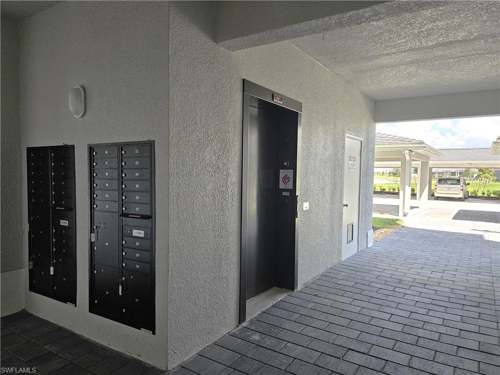 5749 Double Eagle Circle, Unit 4523 Immokalee, FL 34142 - Photo 22 of 47 a view of hallway with bathroom