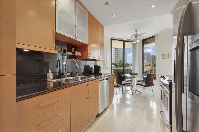 a kitchen with sink cabinets and counter top space