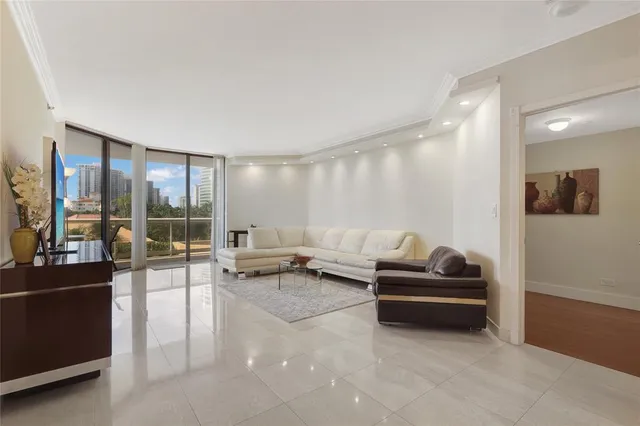 a living room with furniture and a table