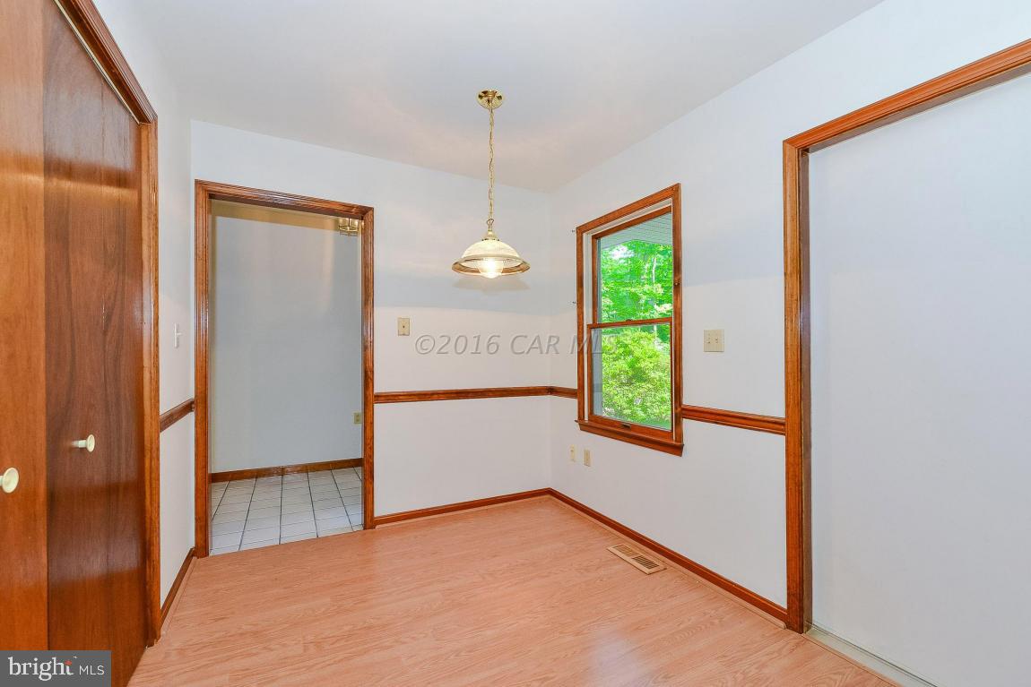 241 Windjammer Road Berlin, MD 21811 - Photo 16 of 38 a view of an empty room and window