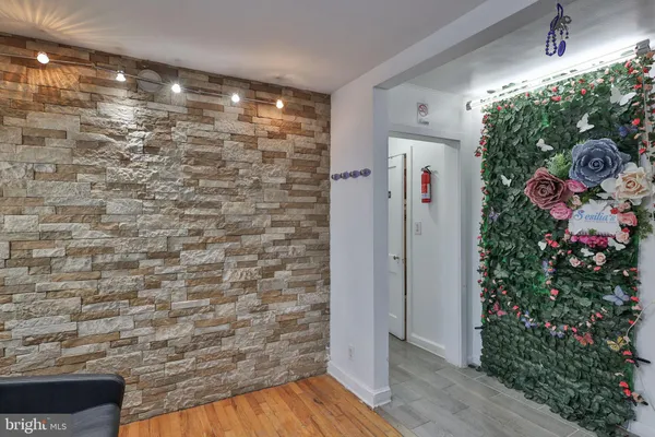 a kitchen with a refrigerator and cabinets