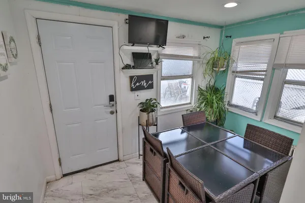 a view of a hallway with washer and dryer