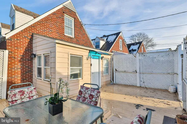 a front view of a house with wooden floor