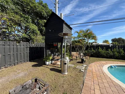a view of a chairs and tables in the patio