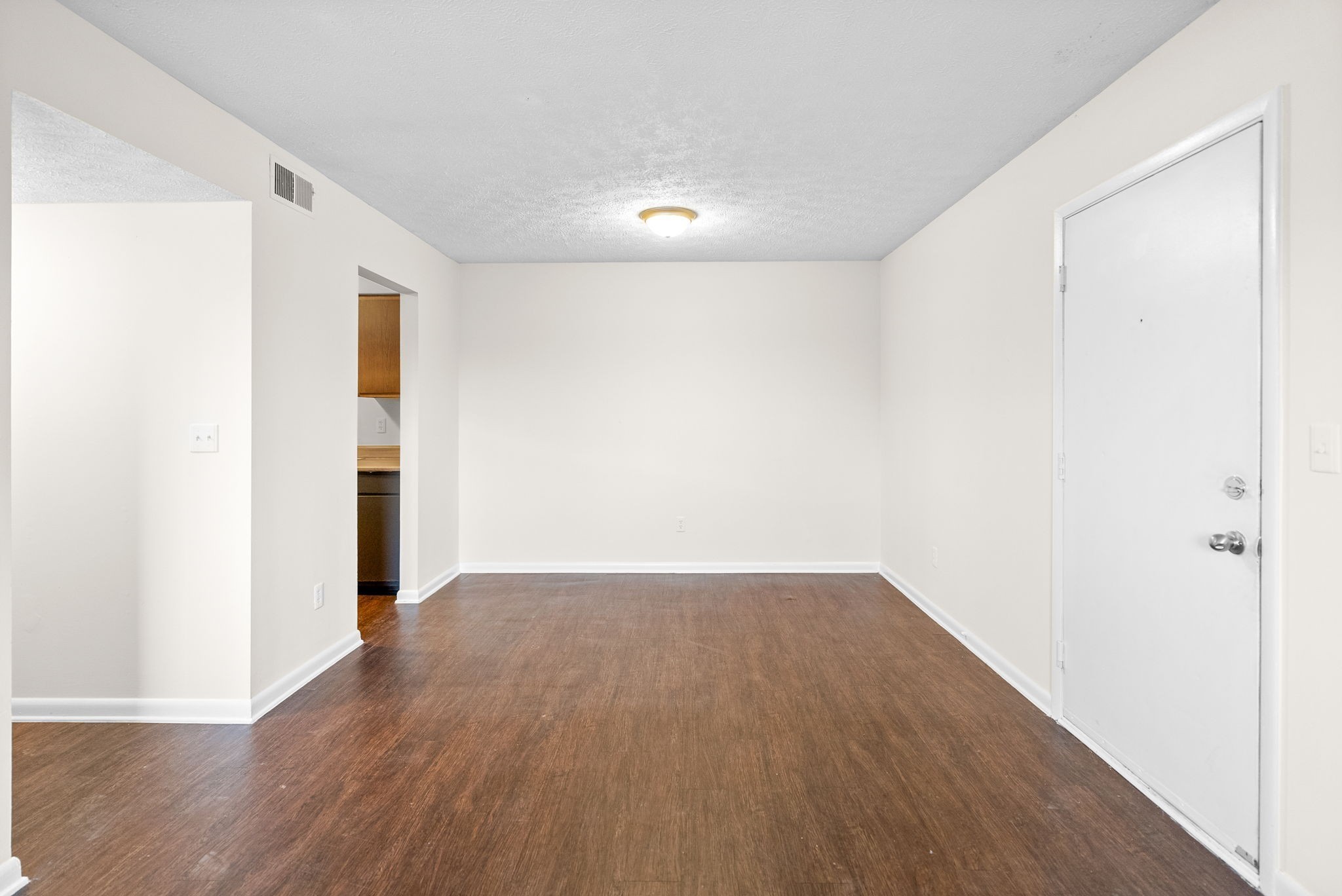 225 Clara Drive, Unit 2B Pembroke, KY 42266 - Photo 4 of 12 an empty room with wooden floor and closet
