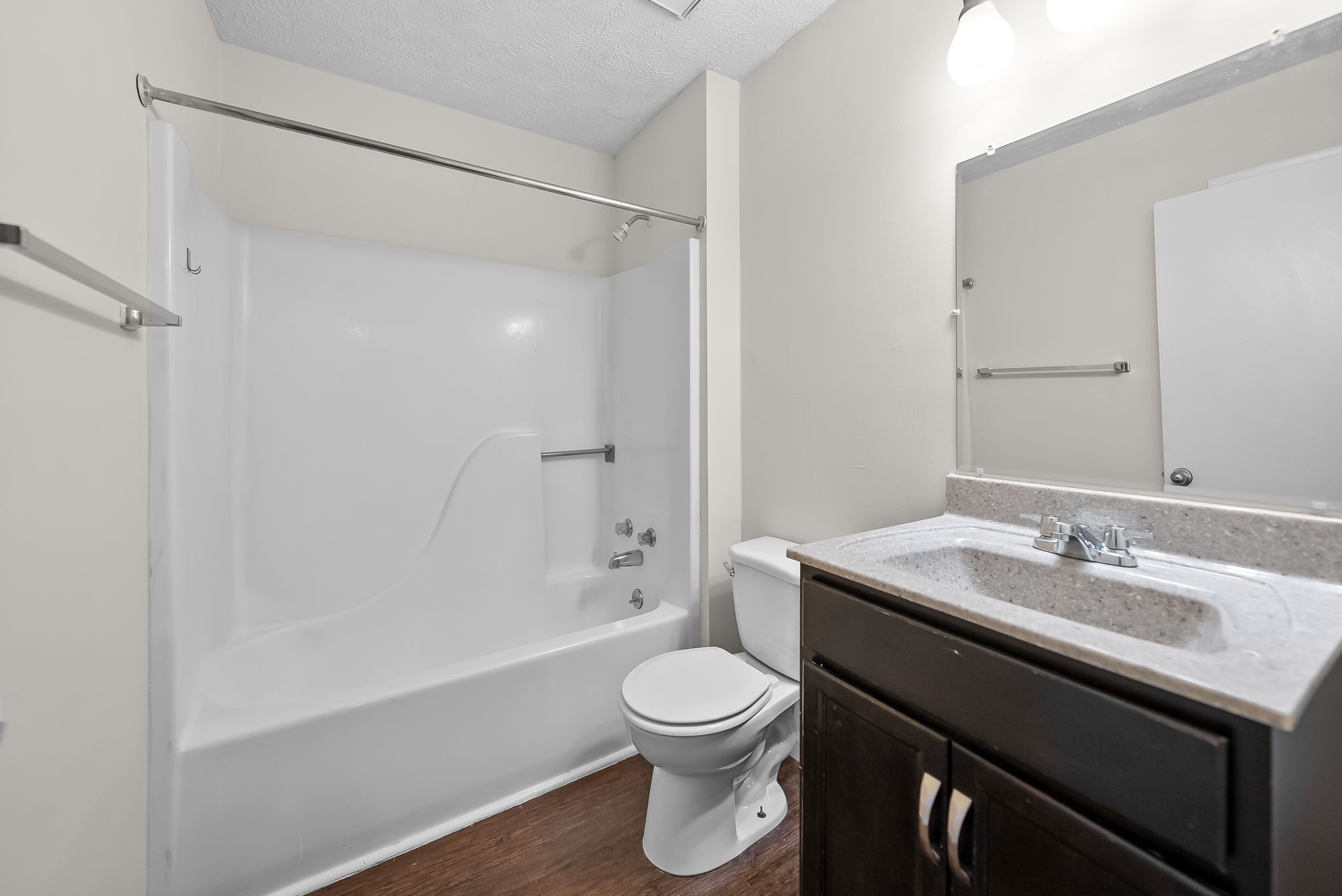 225 Clara Drive, Unit 2B Pembroke, KY 42266 - Photo 9 of 12 a bathroom with a sink a toilet and a mirror