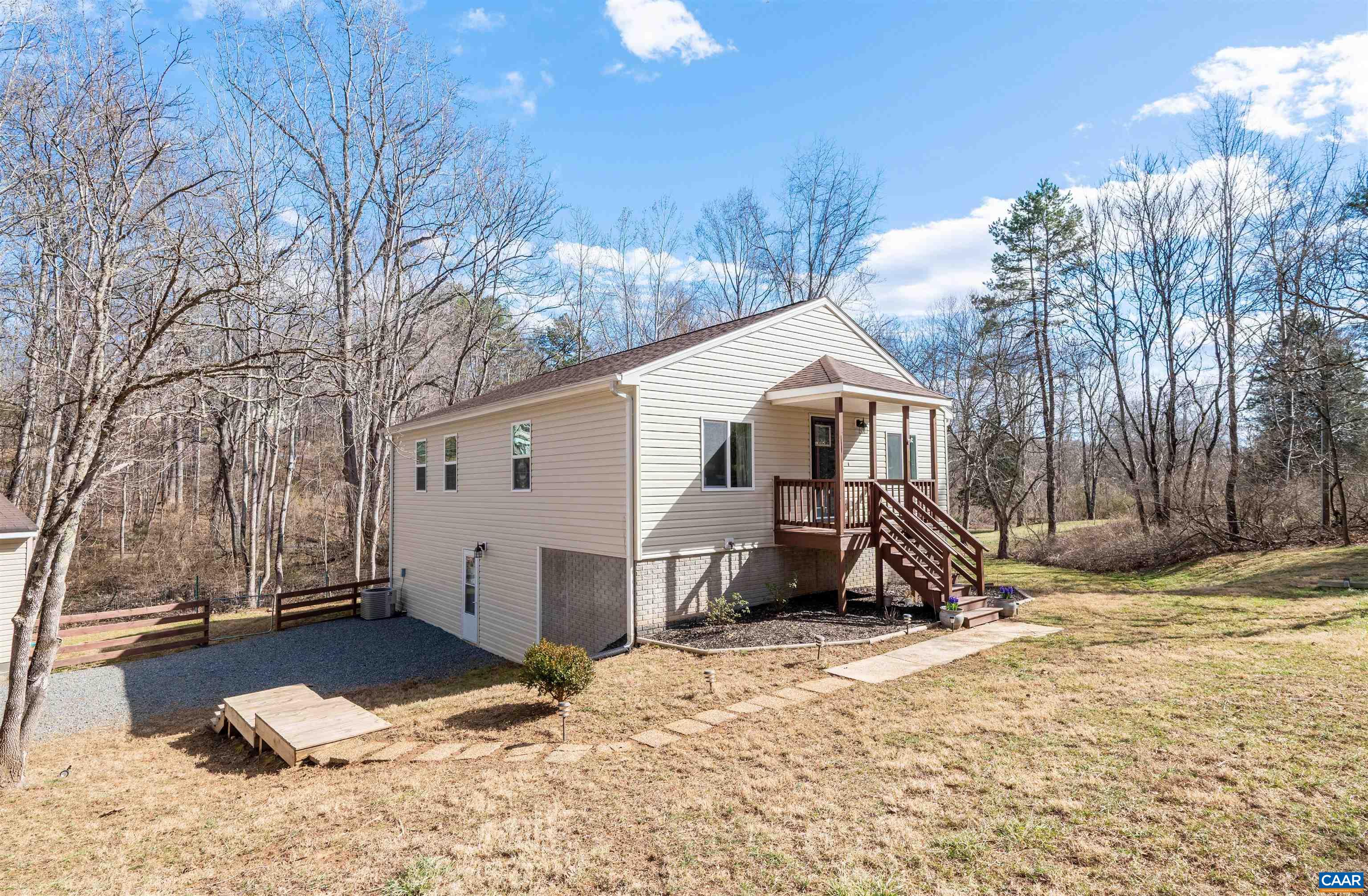 982 West Daffodil Road Ruckersville, VA 22968 - Photo 6 of 44 a view of a house with a snow in the yard