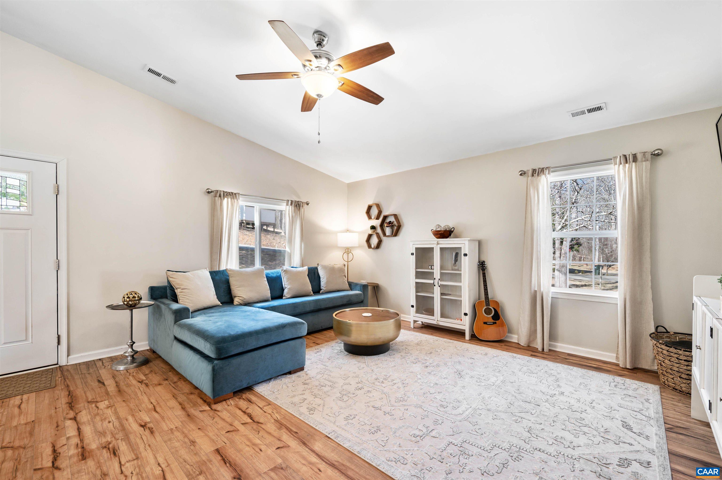 982 West Daffodil Road Ruckersville, VA 22968 - Photo 8 of 44 a living room with furniture and wooden floor