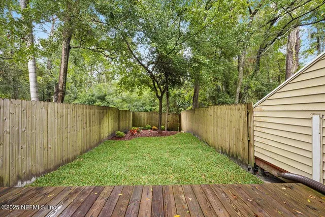 a view of a backyard with a garden