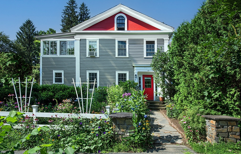 218 Elm Street Northampton, MA 01060 - Photo 1 of 42 a front view of a house with yard and green space