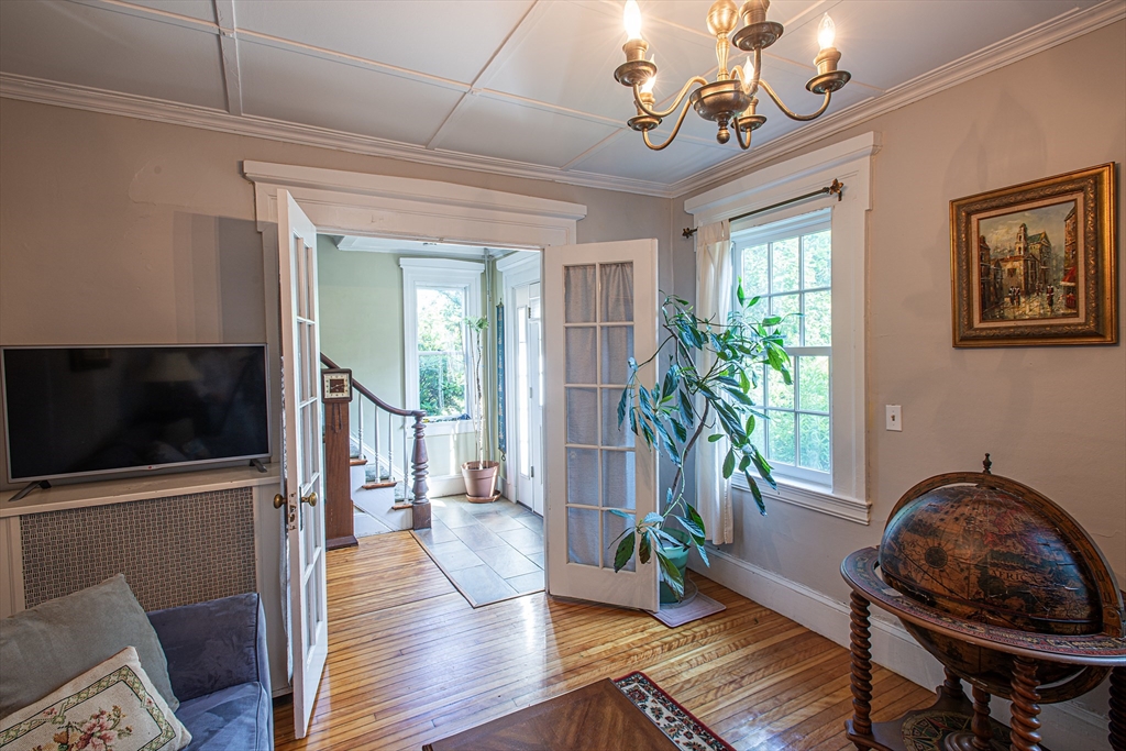218 Elm Street Northampton, MA 01060 - Photo 23 of 42 a view of a livingroom with furniture and hardwood floor