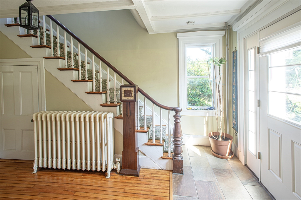 218 Elm Street Northampton, MA 01060 - Photo 28 of 42 a view of an entryway with wooden floor and windows