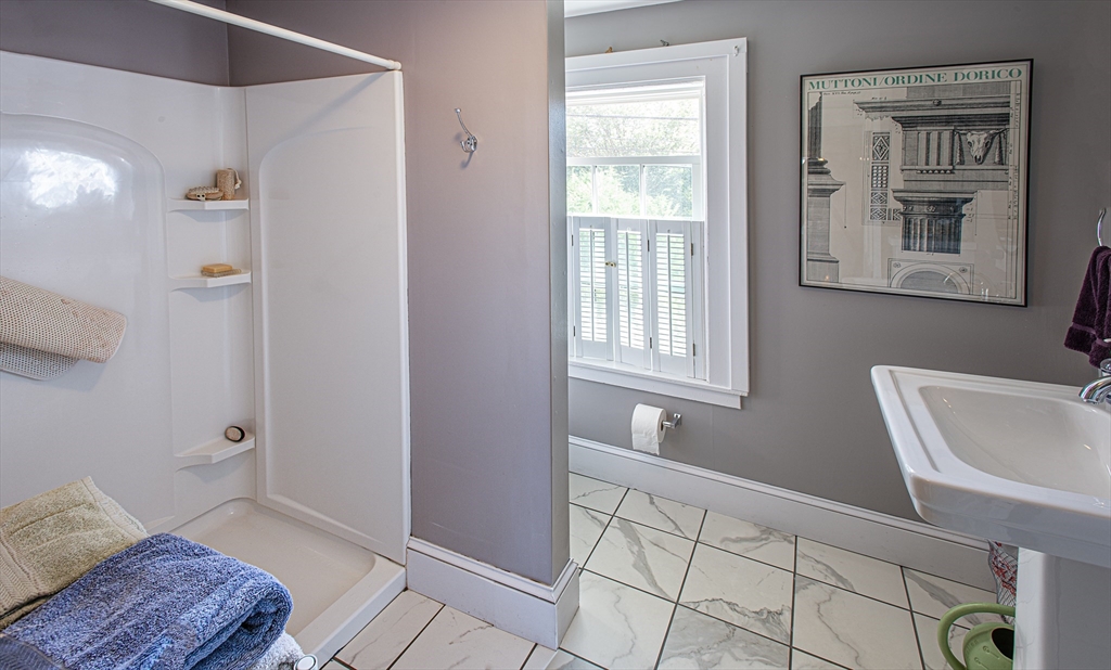 218 Elm Street Northampton, MA 01060 - Photo 29 of 42 a bathroom with a sink and a toilet