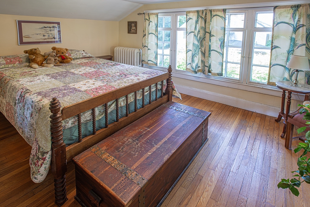 218 Elm Street Northampton, MA 01060 - Photo 40 of 42 a bedroom with furniture and a wooden floor