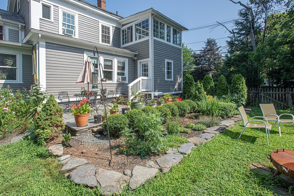218 Elm Street Northampton, MA 01060 - Photo 7 of 42 a front view of a house with garden and porch