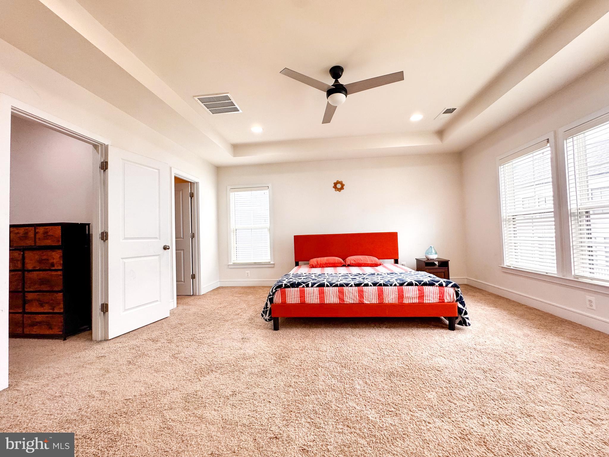 25419 Reed Orchard Terrace Chantilly, VA 20152 - Photo 28 of 47 a bedroom with a bed and a chair