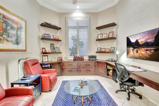 a spacious bathroom with a granite countertop sink and a mirror
