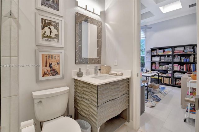 a swimming pool with outdoor seating and yard