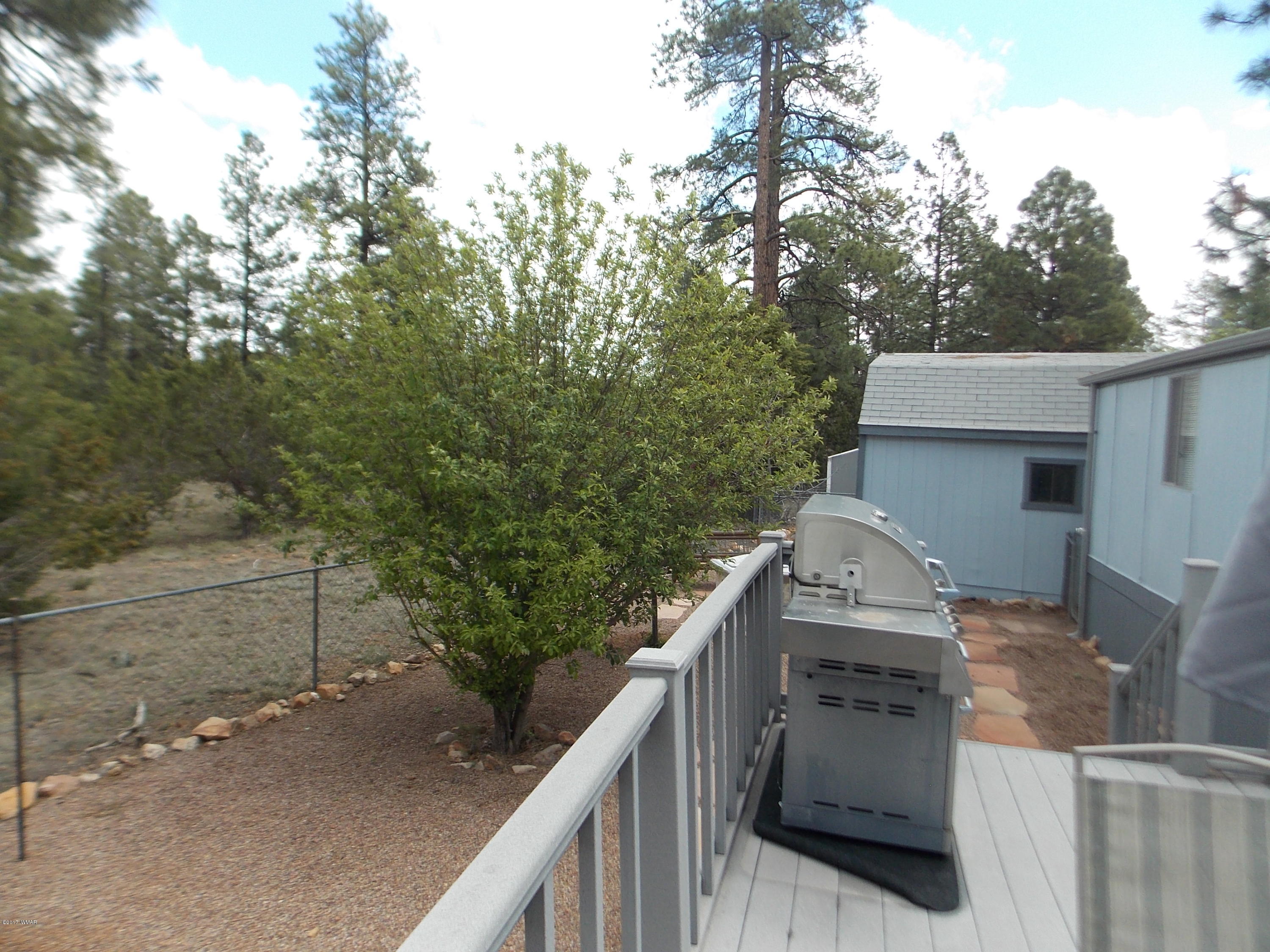 1978 Rustling Pine Drive Heber, AZ 85928 - Photo 14 of 21 a view of a wooden house and a street view