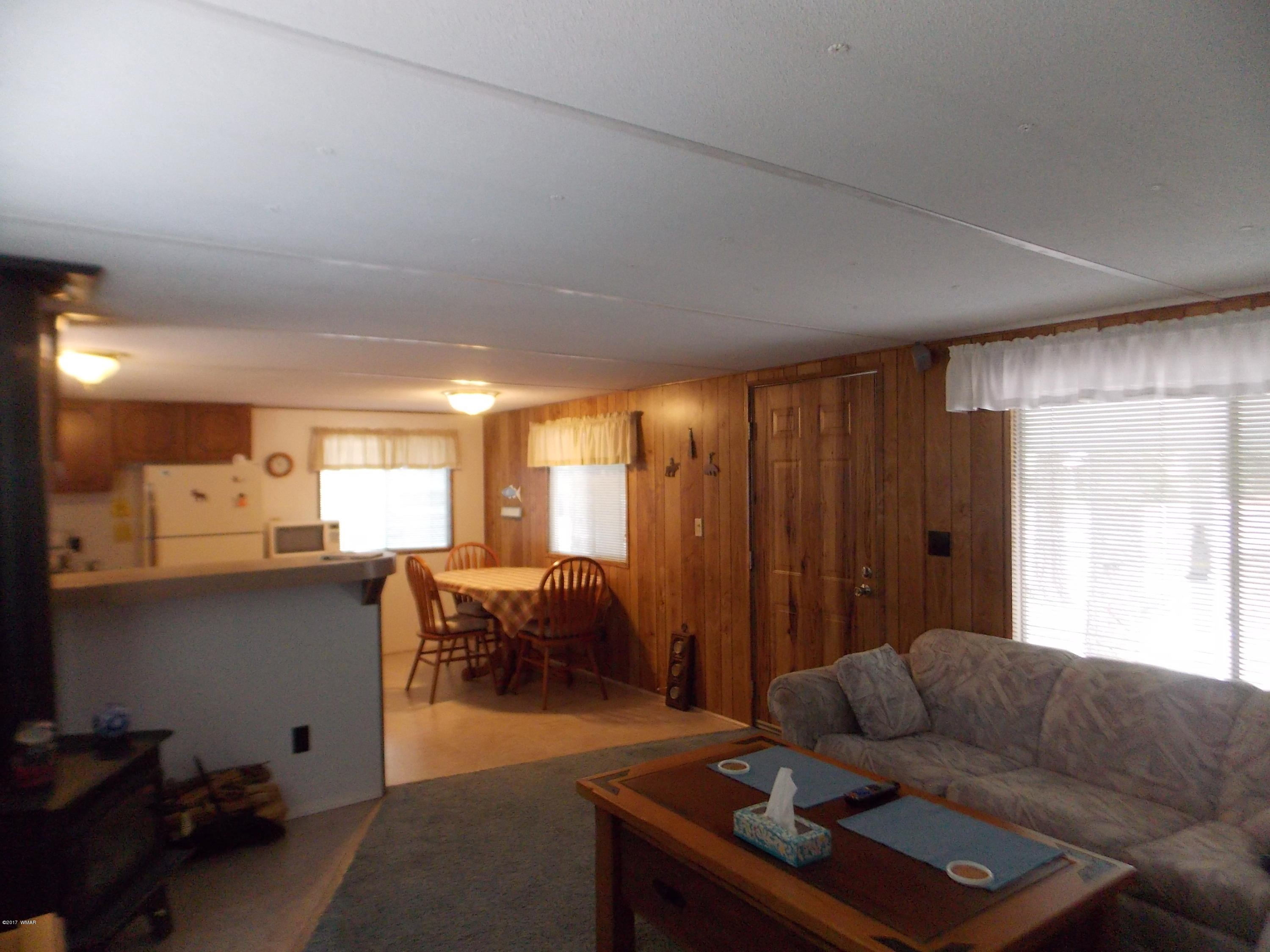 1978 Rustling Pine Drive Heber, AZ 85928 - Photo 3 of 21 a living room with furniture and a large window