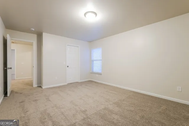 an empty room with a natural light