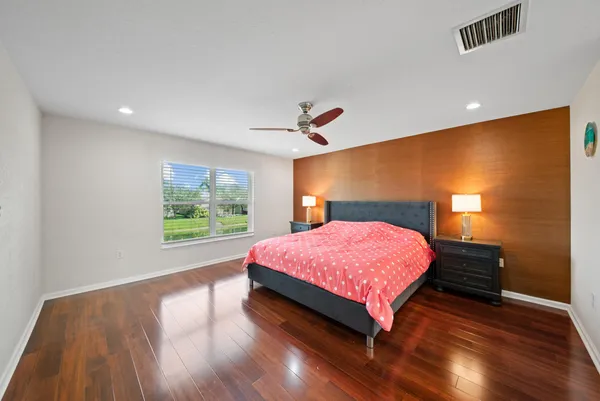 a view of a dining room with furniture and window
