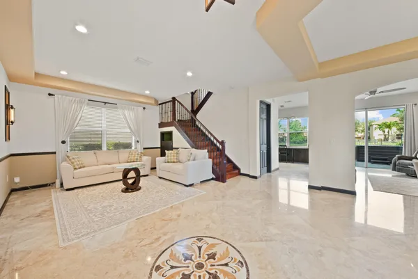 a utility room with cabinets washer and dryer