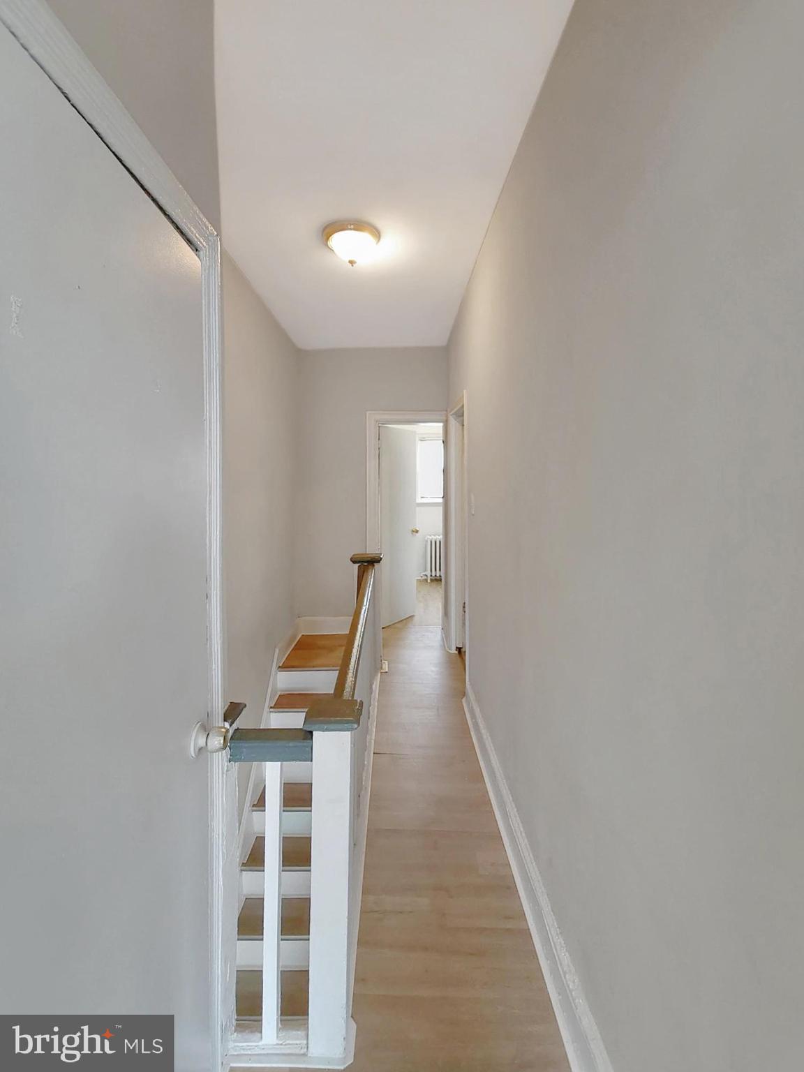 2015 Pierce Street Philadelphia, PA 19145 - Photo 11 of 15 a view of an empty room with wooden floor