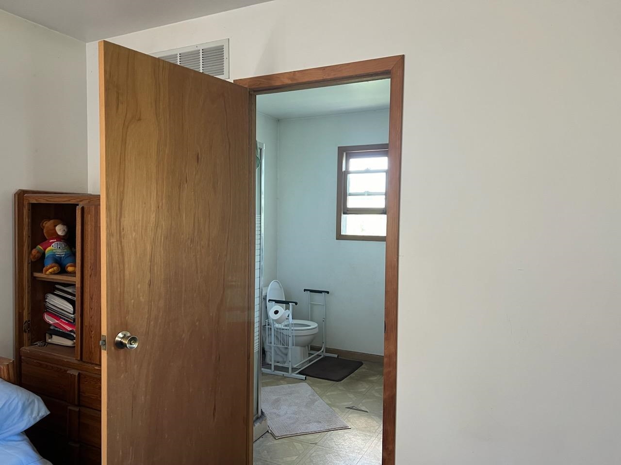 5773 East Brick Road Oregon, IL 61061 - Photo 7 of 7 a bathroom with a toilet