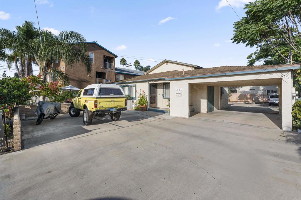 1461 14th Street Imperial Beach, CA 91932 - Photo 1 of 25 a view of a house with a patio and a yard