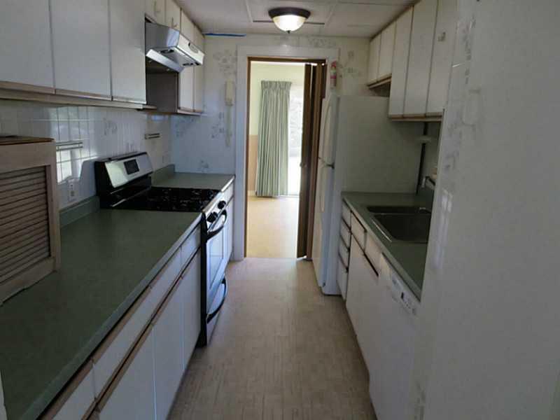 136 Wood Road Gorham, ME 04038 - Photo 4 of 19 Kitchen. Galley kitchen between...