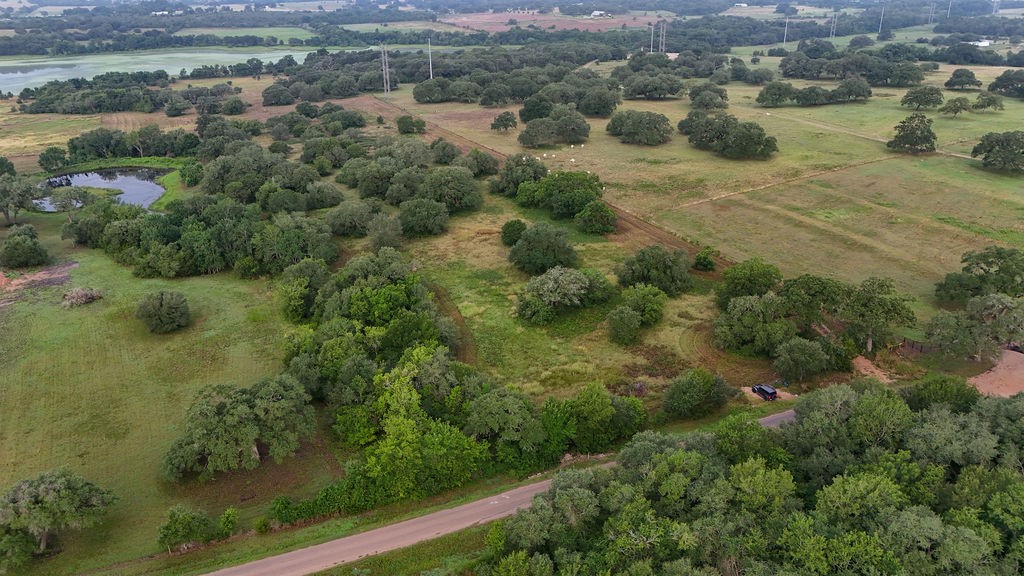 9365 Bauer Road Fayetteville, TX 78940 - Photo 1 of 16 an aerial view of a houses with a yard