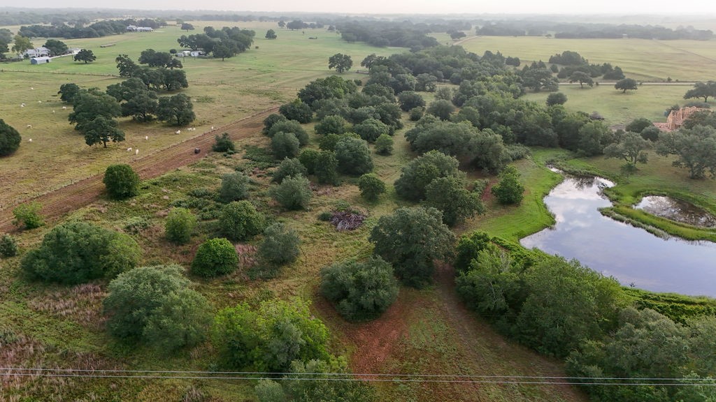 9365 Bauer Road Fayetteville, TX 78940 - Photo 16 of 16 an aerial view of a houses with outdoor space