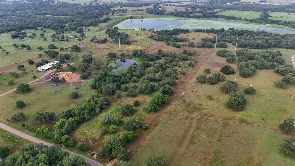 9365 Bauer Road Fayetteville, TX 78940 - Photo 3 of 16 an aerial view of mountains with green space