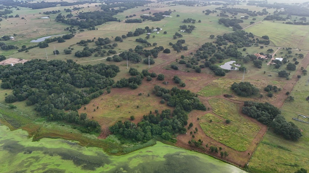 9365 Bauer Road Fayetteville, TX 78940 - Photo 7 of 16 an aerial view of residential houses with outdoor space