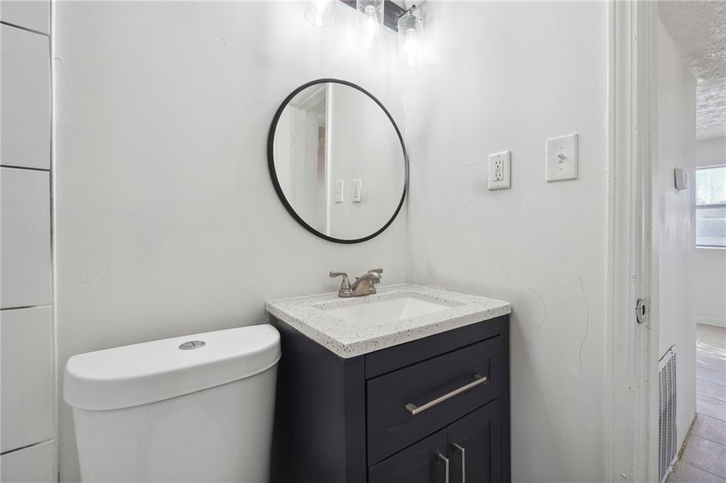 324 Brooks Avenue Southwest, Unit B Atlanta, GA 30310 - Photo 22 of 25 a bathroom with a sink and a toilet