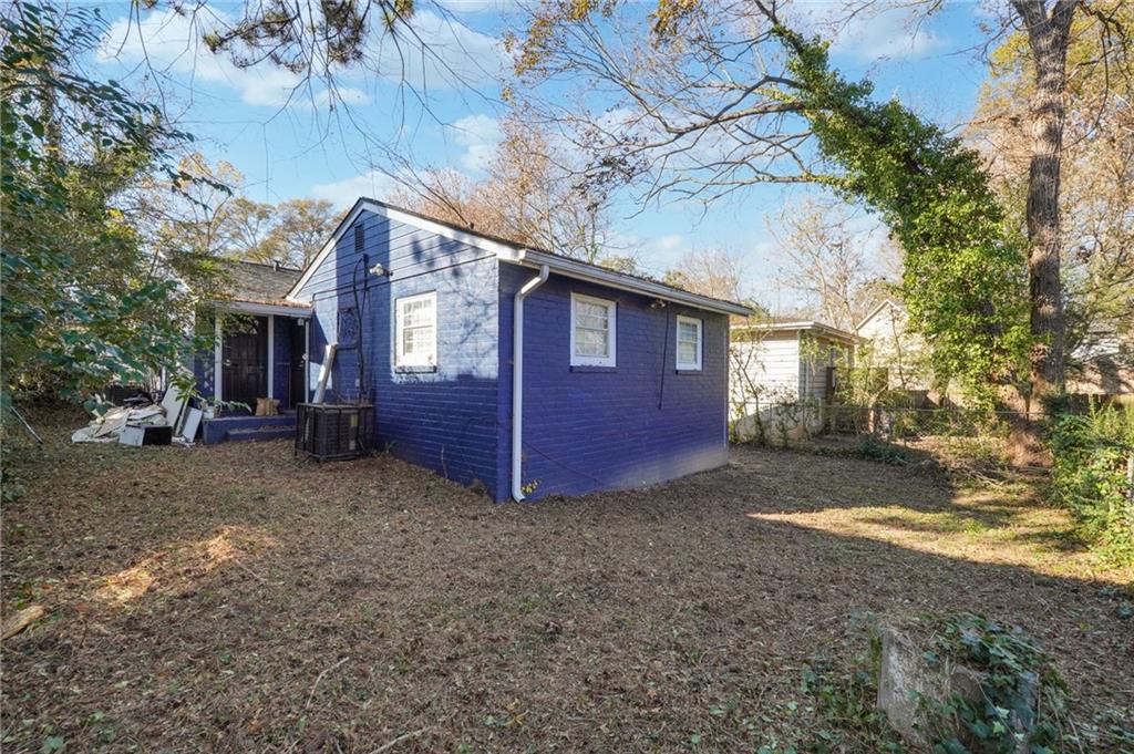 324 Brooks Avenue Southwest, Unit B Atlanta, GA 30310 - Photo 24 of 25 a view of a house with a yard