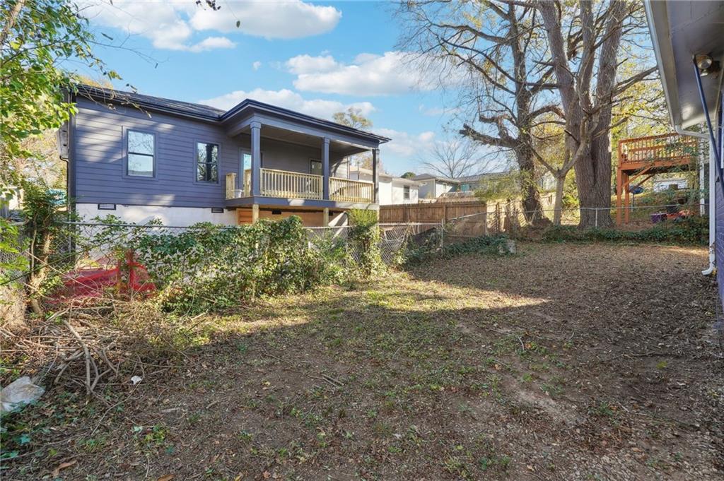 324 Brooks Avenue Southwest, Unit B Atlanta, GA 30310 - Photo 25 of 25 a front view of a house with a yard