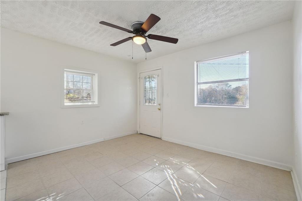 324 Brooks Avenue Southwest, Unit B Atlanta, GA 30310 - Photo 5 of 25 a view of an empty room with a window