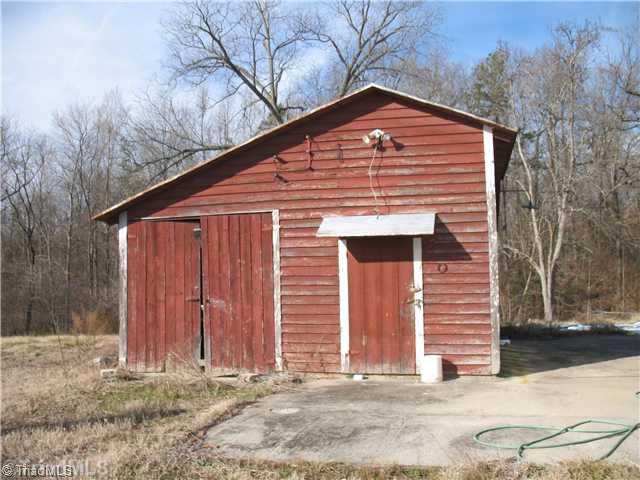344 Edward Road Thomasville, NC 27360 - Photo 5 of 11 Stable/Barn. One of many Storage buildings on property.