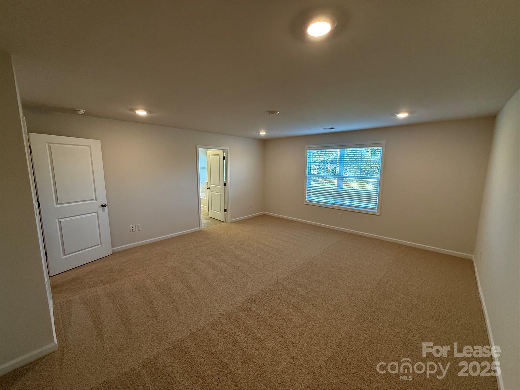 4144 Steel Way Sherrills Ford, NC 28673 - Photo 17 of 24 a view of an empty room with a window