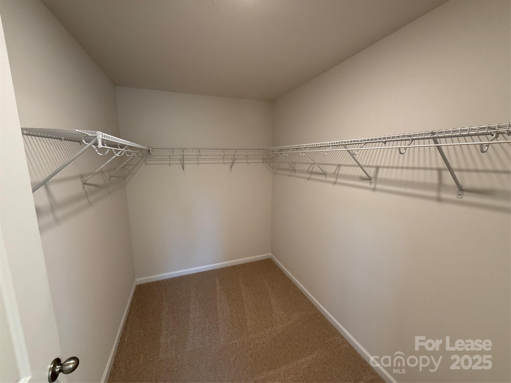 4144 Steel Way Sherrills Ford, NC 28673 - Photo 19 of 24 a view of a room with racks on the wall