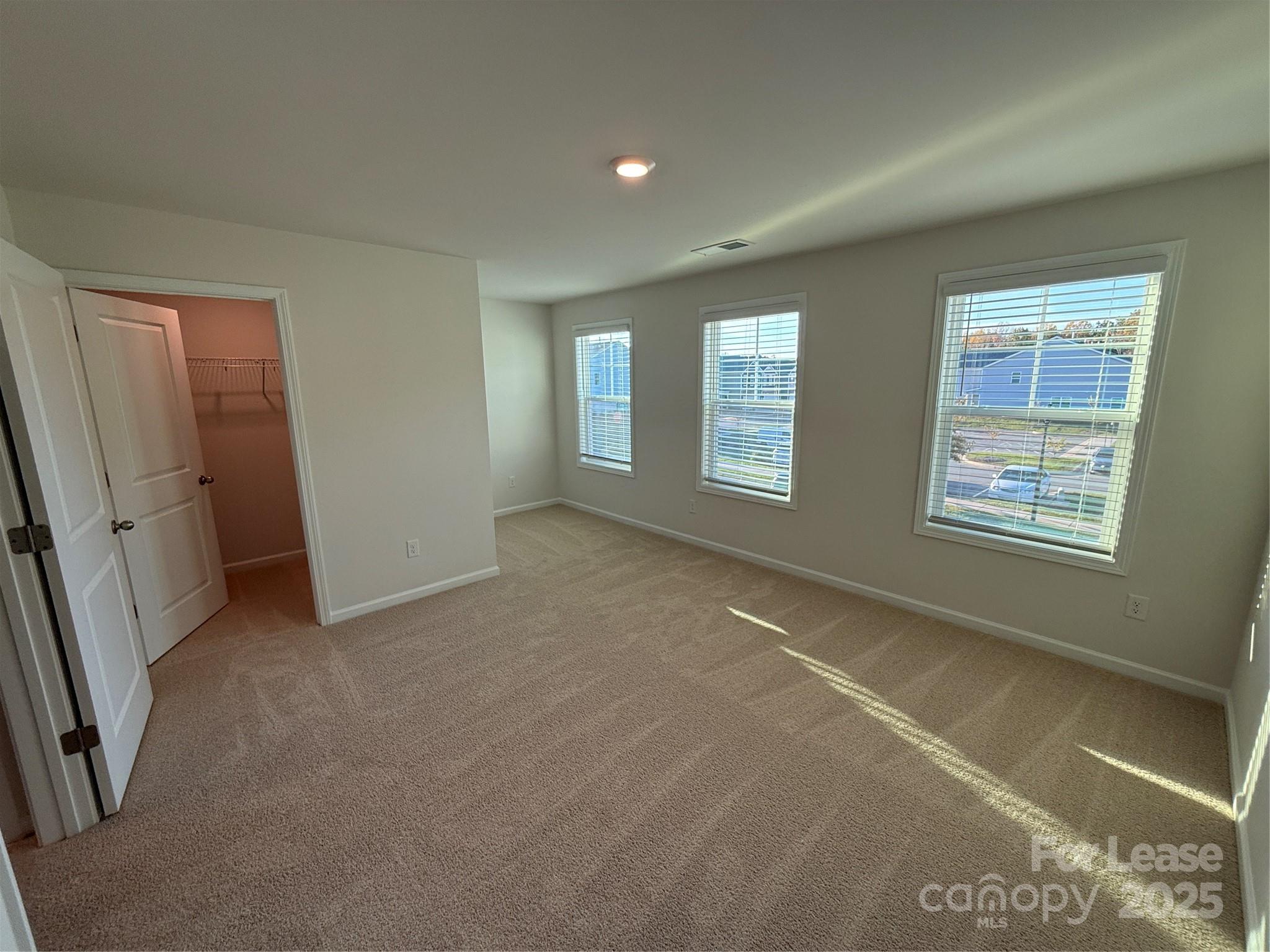 4144 Steel Way Sherrills Ford, NC 28673 - Photo 22 of 24 an empty room with windows