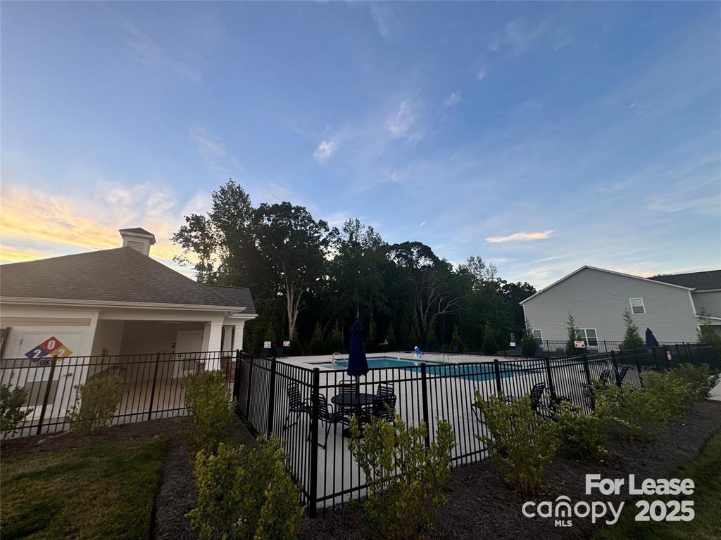 4144 Steel Way Sherrills Ford, NC 28673 - Photo 23 of 24 a view of a house with backyard and sitting area