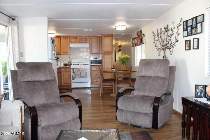 303 South Recker Road, Unit 223 Mesa, AZ 85206 - Photo 19 of 31 a living room with furniture and a large window